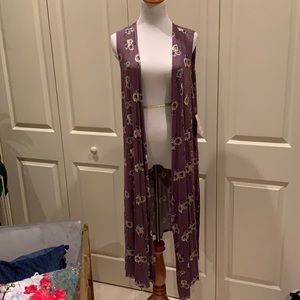 Lularoe Joy size small. Purple floral pattern.